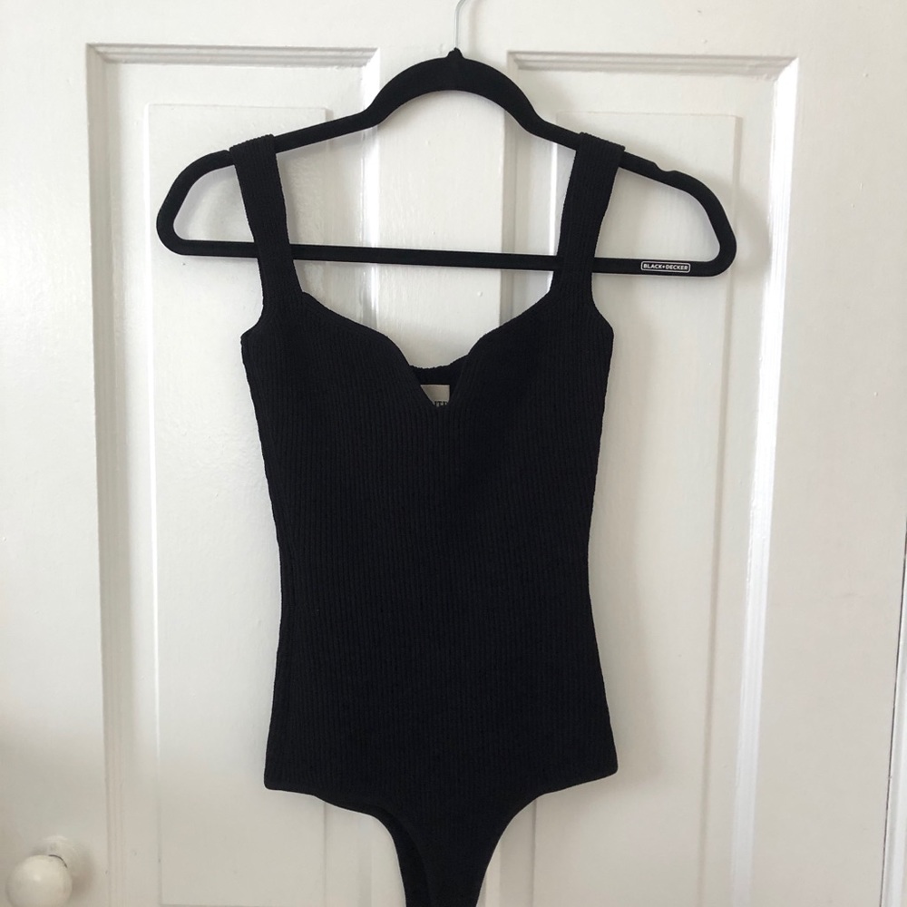 Khaite ribbed-knit Yves Bodysuit in Black. Size Small. Worn once